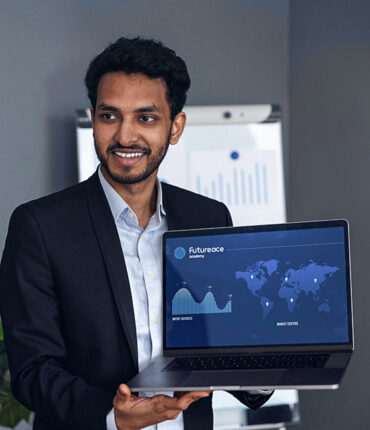 A student of futureace academy is shown where he is in formal attire and is smiling after completing a presentation