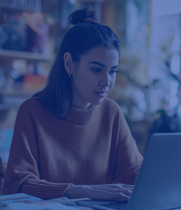 image of a female student in Healthcare Business Development, Marketing, and Analytics course of futureace academy working on her laptop